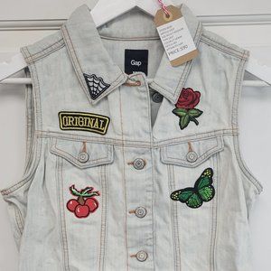 Adult medium jean vest light blue with iron on patches